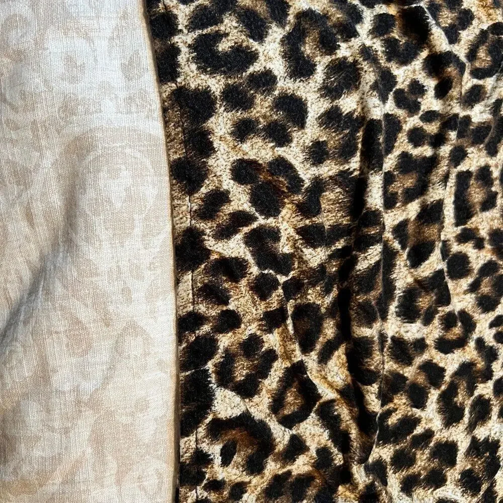 Michael Kors animal print 3/4 sleeve top with elastic hem  Size M